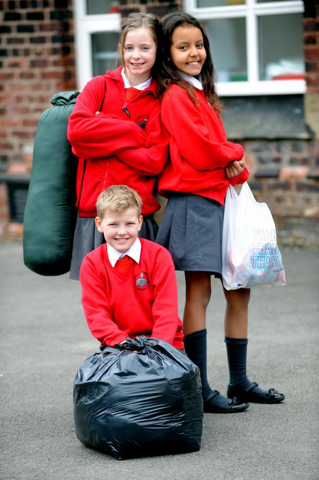 HELPING THE HOMELESS: Class 5 of St Saviour CE Primary School. Credit: The Bolton News