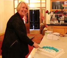 Founder Lesley Fisher cutting the special birthday cake