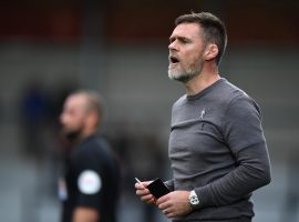 Salford City's manager Graham Alexander on the touchline