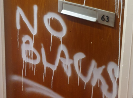 Man who wrote ‘No blacks’ on African family’s door held in custody for own protection