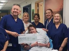 Michelle Pearson presented a cheque to staff at Wythenshawe  burns unit