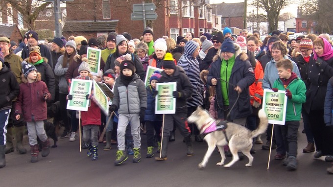 Protests against the housing plans [credit: ITV News]