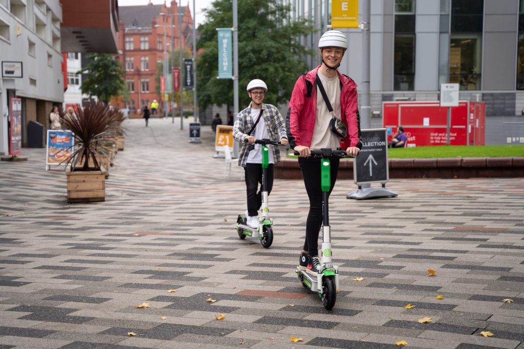 riding e-scooters in Salford