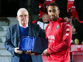 Ibou Touray receiving an award for his 200th Salford appearance. Credit: Charlotte Tattersall Photography