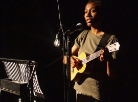Chisara Agor playing live during the performance of Tomorrow Is Not Promised. Credit and permission: The Lowry Theatre Flickr.