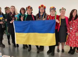 Female councillors wear traditional Ukraine wreaths 'Vinochky' to support Ukraine. (Credit: Tanya Burch)