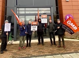 GMB members working for Usdaw picket the union's Salford headquarters on a recent strike day