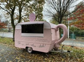 Van shaped like pink teapot heading out to streets of Salford to share brews and views