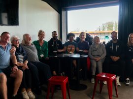 Salford City duo make surprise visit to dementia support group