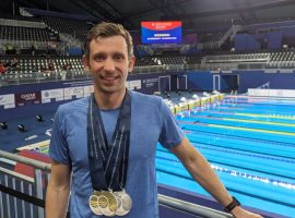 Salford medic swam to double world champion success in Qatar