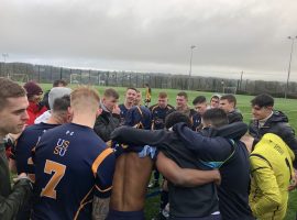 Members of the first and second teams celebrate after the match