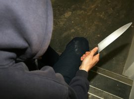 File photo dated 25/4/09 of a man holding a knife. More prisons should be built to combat Britain's knife crime epidemic, a police leader has suggested. John Apter, chairman of the Police Federation of England and Wales, hit out at proposals to reduce the number of short jail sentences.