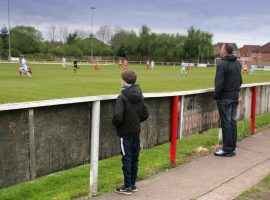 Supporters at a non-league game in Wigan.  Credit: Nick Harling