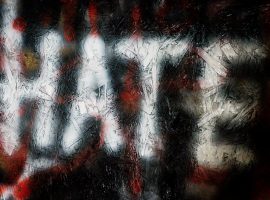 File photo dated 21/03/17 of graffiti on a wall in Bristol. Hate crimes hit a record high in the last year with a surge in the number of reported offences triggered by sexual orientation and transgender identity, official figures show. Credit: PA Images