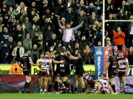 Salford Reds Joey Lussick is congratulated after scoring during the Betfred Super League semi final match at the DW Stadium, Wigan.