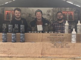 James Harrison (middle) of The Salford Rum Company at the Manchester Christmas Markets. Credit: Caleb Staples