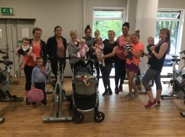 Parents at child-friendly spin class.