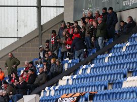 Salford City fans in attendance at Colchester United. Credit: Salford City