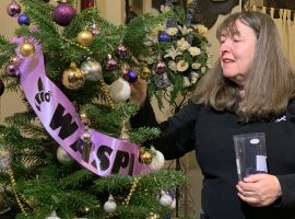 Marie Cottan decorating WASPI Christmas Tree. Credits: Zulekha Irfan