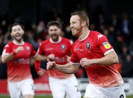 Salford City's Adam Rooney celebrates scoring his side's first goal of the game