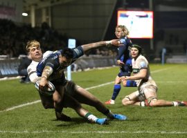 SALFORD, ENGLAND - MARCH 06: Denny Solomona of Sale Sharks scores a try as Ollie Hassell Collins of London Irish attempts to tackle during the Gallagher Premiership Rugby match between Sale Sharks and London Irish at  on March 06, 2020 in Salford, England