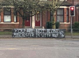 Banner outside of Manchester Royal Infirmary showing solidarity. Image credits: Holly Pritchard 2020