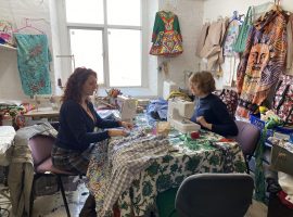 Pupils working on up cycling their clothes. 
Copyright: Zoe Bott