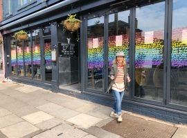 Emma Evans working on window art. Image Credit: Emma Evans.