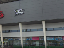 Sale Sharks' logo on the exterior of the AJ Bell Stadium