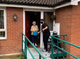 Lisa bringing Meals on Wheels to Salford residents