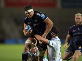 Sale Sharks' Jono Ross (left) is tackled by Northampton Saints' Tom Wood during the Gallagher Premiership match at the AJ Bell Stadium, Salford.