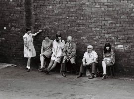 Workers on a break at the Protector Lamp and Lighting Company Eccles. Credit: George Shepherd