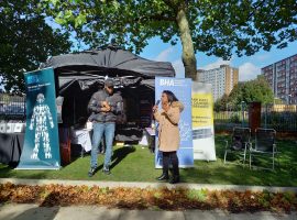 Black History Month stall, featuring poet Griot Gabriel and Sexual Health Advisor for BHA for Equality, Elisabete Miranda, credit: Jennifer Mawby