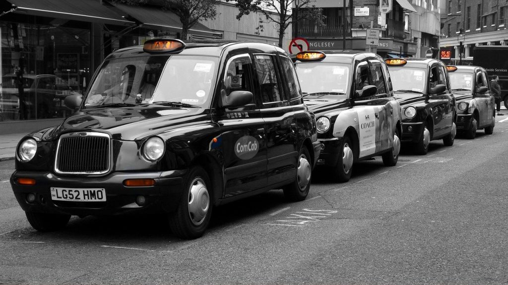 Black taxis in Salford, who will be facing the new taxi driver's dress code. Photo credit: Tommes64 https://pixabay.com/photos/london-covent-garden-taxi-england-2878425/