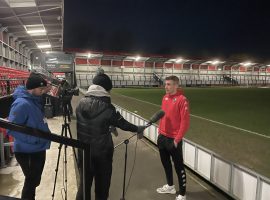 Matty Lund speaks to the press after the game.