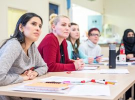 Students at a English language lesson at the Yemeni Community Association in Eccles - Press Release - Salford City Council