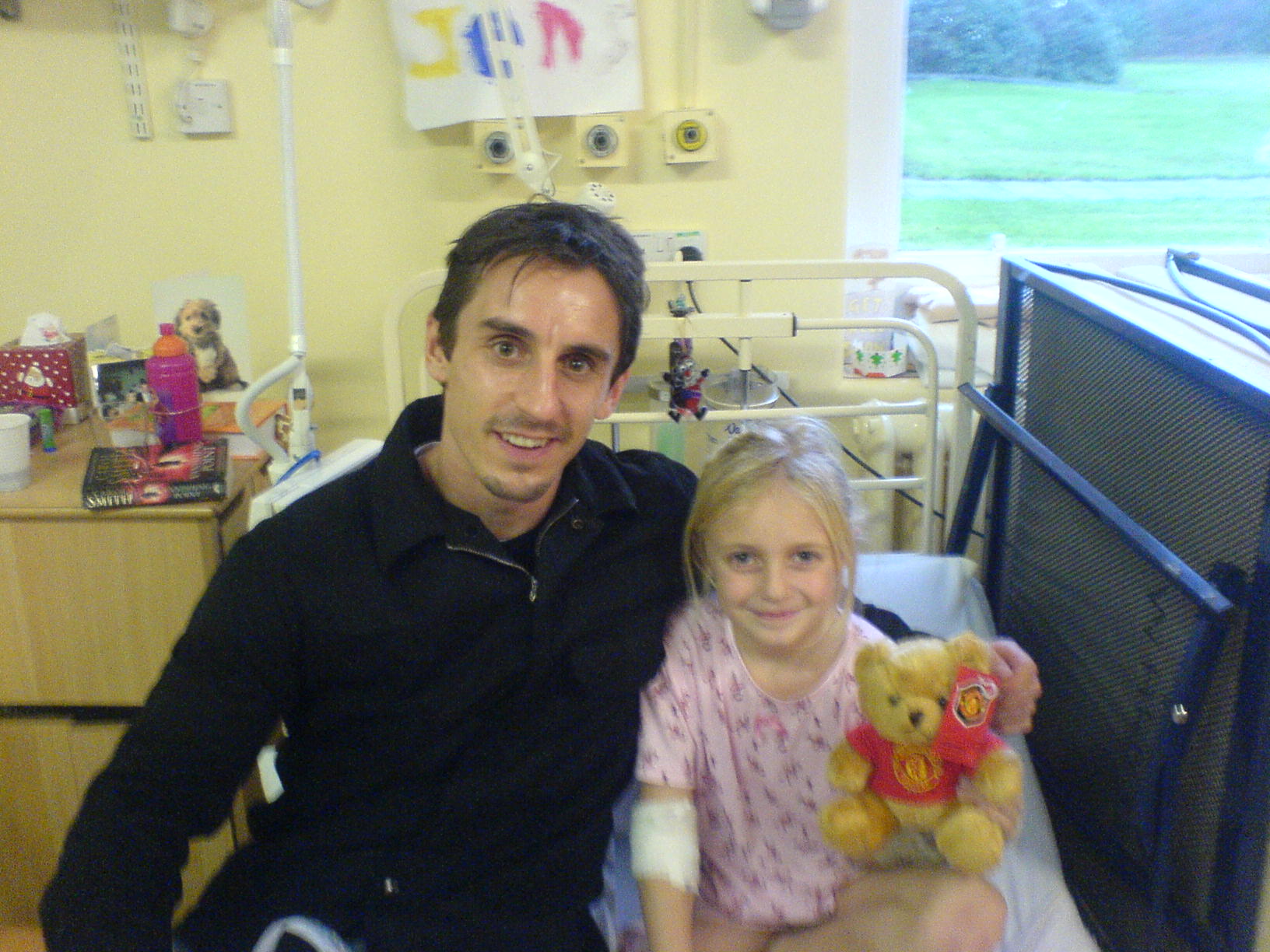 Ulcerative colitis sufferer Jenny as a child with Gary Neville. Photo: Jenny Byrne, used with permission.