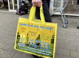 Photo of the 'bags for life' suicide prevention messages campaign