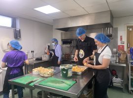 Volunteers preparing the food for FoodCycle.
Credit: Eden Latimer
