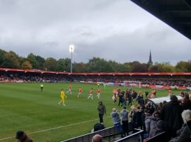 Salford City and Bradford City players enter the pitch prior to kick-off