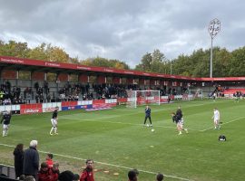 Salford City warming up for their match against Stockport County. Image credit - Dan McNeice