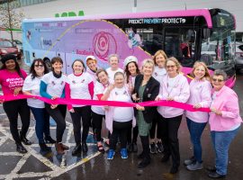 The big pink bus hits Manchester to raise awareness of breast screening.
Pictured at Eastlands ASDA.

PIC shows Margo Cornish (Campaign Founder) with scissors with volunteers.