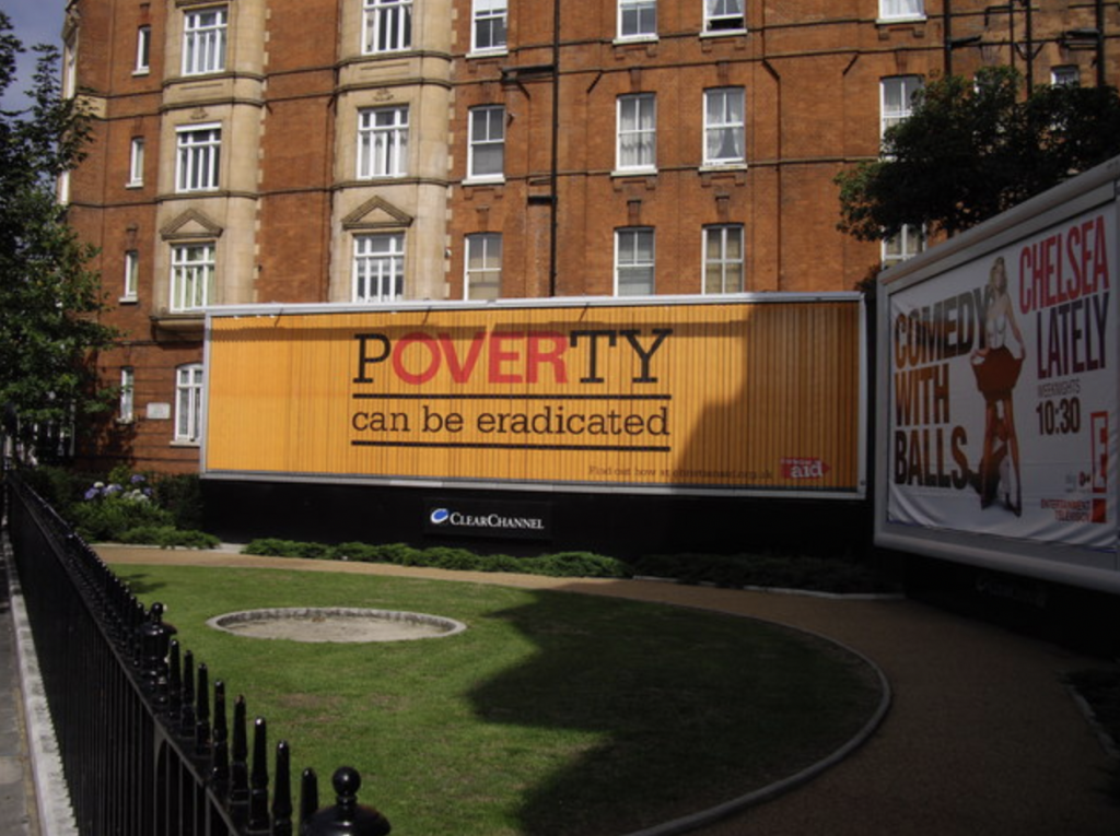 https://commons.wikimedia.org/wiki/File:Poverty_can_be_Eradicated_Billboard_-_geograph.org.uk_-_1422711.jpg Salford