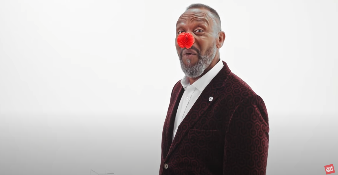 Red Nose Day's promotional video showcasing their new nose ahead of the live Red Nose Day show in Salford. Image taken from https://www.youtube.com/watch?v=ku-I59smdPM