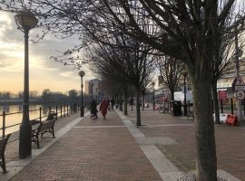 People walking along the quays. Image by Harry Warner.