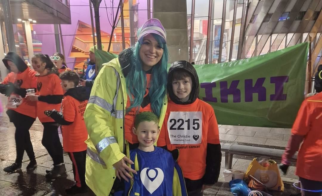Nikki's partner Sharne and their sons at the Christie's 'Night of Neon' event Image taken and given permission to use by Sharne Wilkinson Salford family to host Easter fun day.
