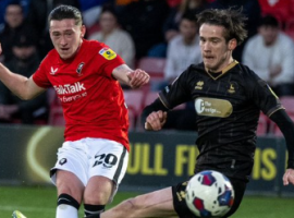 Louie Barry strikes (Photo from Salford City Twitter)