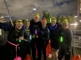 Allison, Anita and their group of friends at the Halloween night swim