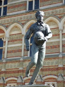 William Webb Ellis Statue outside Rugby School. Credit: Wikicommons. https://commons.wikimedia.org/wiki/File:Rugby_School_-_Dunchurch_Road,_Rugby_-_statue_of_William_Webb_Ellis_%2833162872973%29.jpg