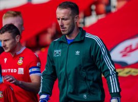 Alex Cairns leading Salford City out against Wrexham. Credit: Salford City FC